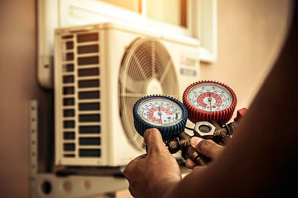 Professional Heat Pump Repair technician working in Defiance, MO